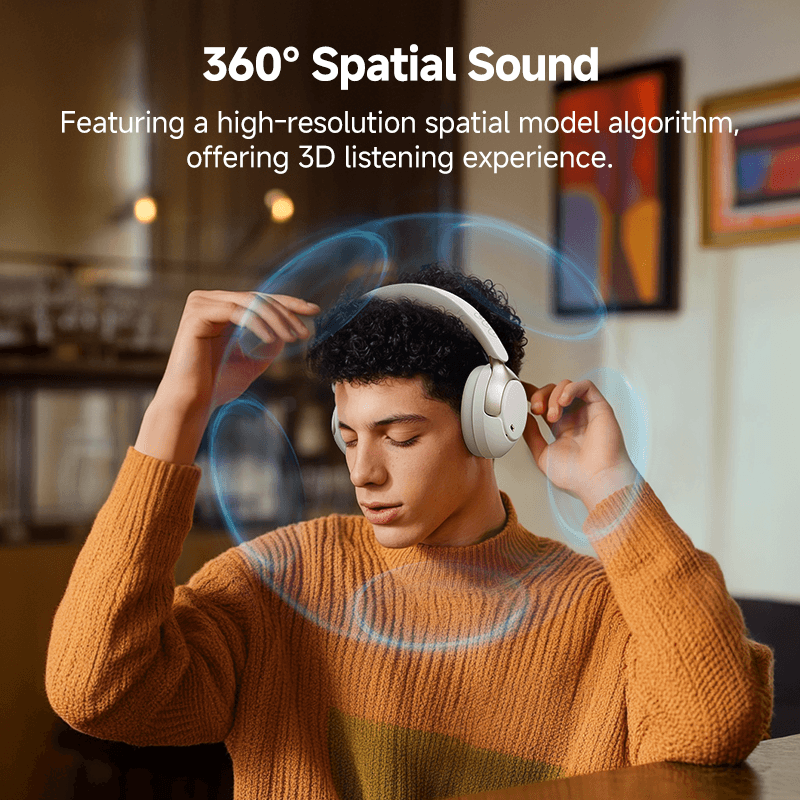 Auriculares Lila QCY H3 Pro com som espacial 360° para uma experiência auditiva 3D, aqui apresentados no modelo em ambiente interior.