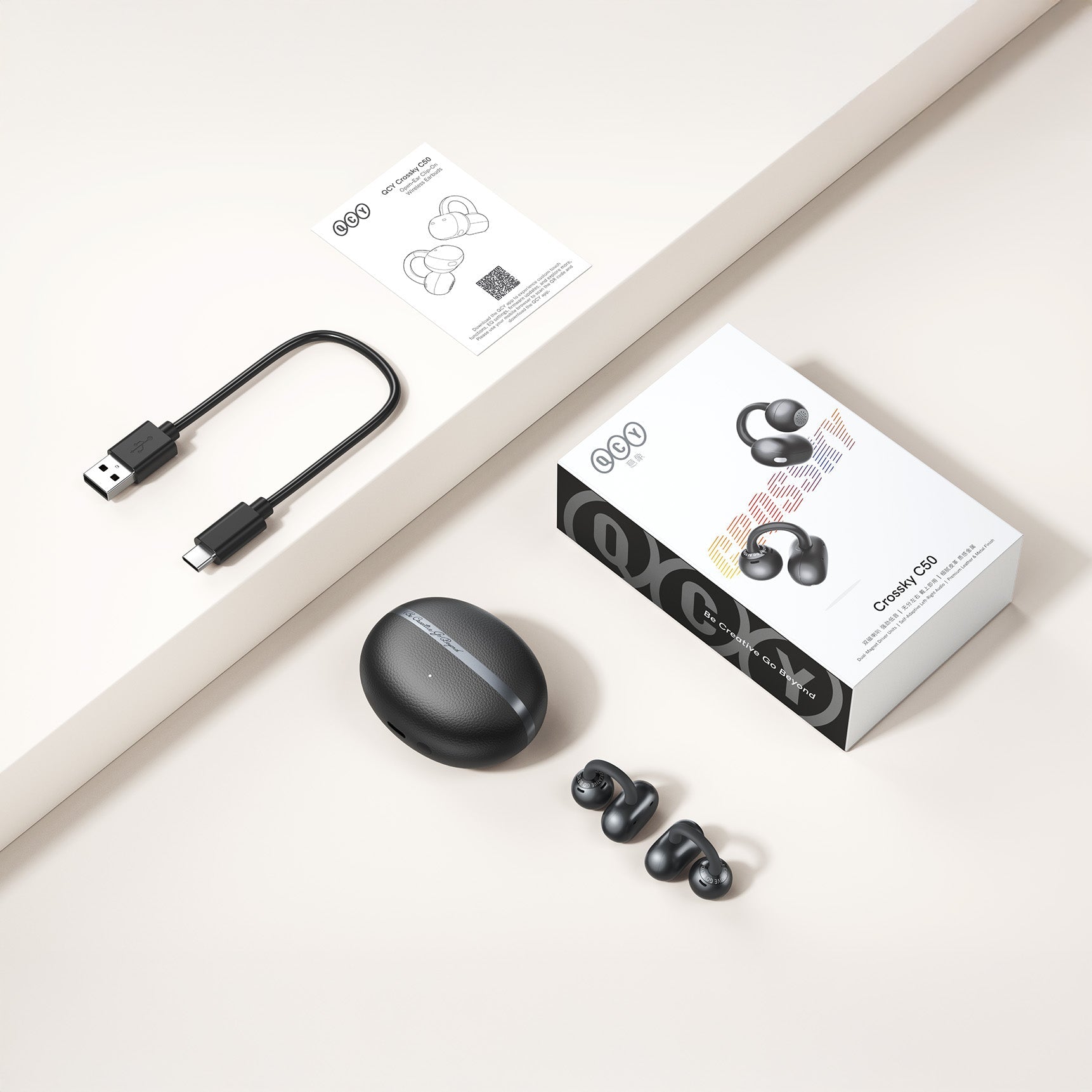 Auriculares True Wireless QCY Crossky C50 com estojo de carregamento, USB-C e manual.