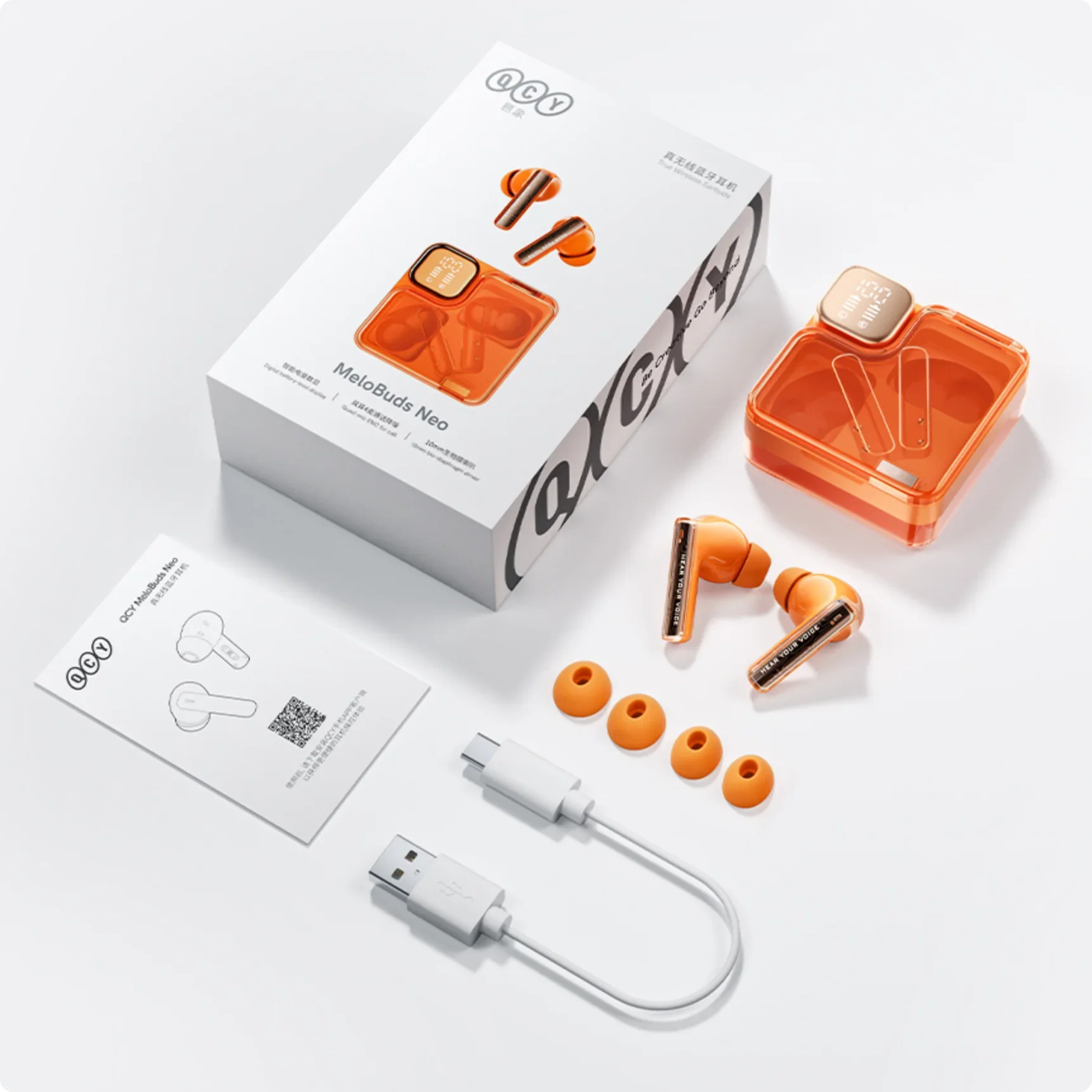 QCY MeloBuds Neo: Auscultadores True Wireless laranja com estojo de carregamento, cabo USB-C e pontas de substituição.