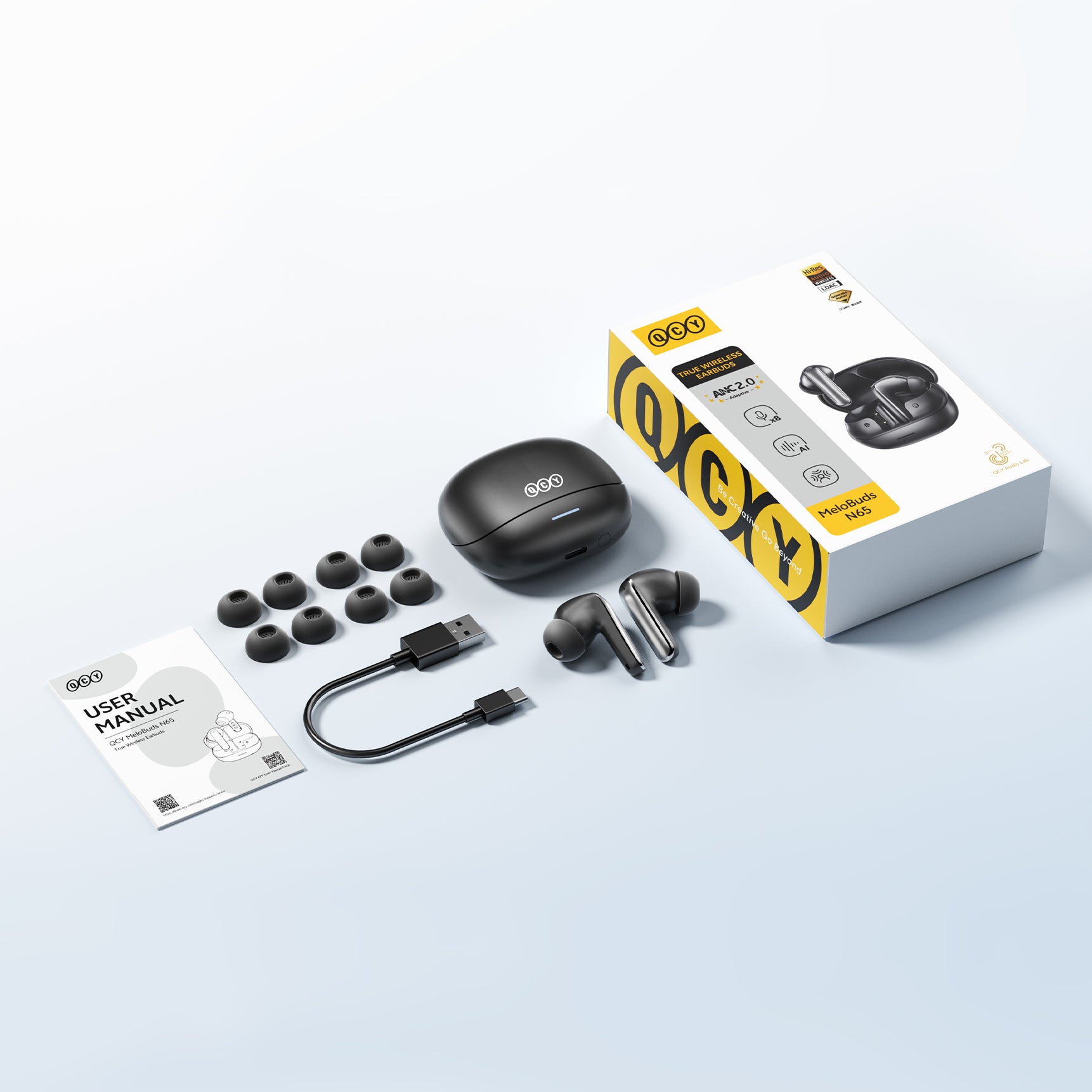 Auriculares True Wireless QCY MeloBuds N65 com ANC, cabo de carregamento USB-C e pontas de substituição.