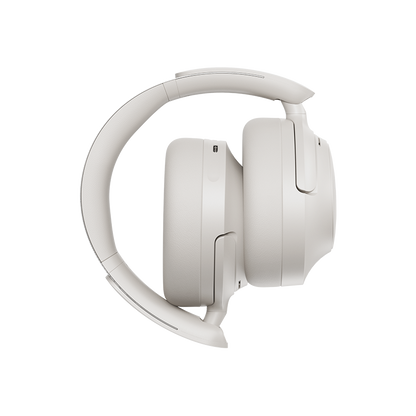 Auscultadores QCY H3S Over-Ear brancos, vista lateral esquerda com arco de cabeça macio e acabamento premium.